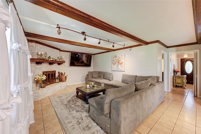 1223 Green Briar Dr, Huntsville, TX 77340 - living room featuring light tile patterned floors, ornamental molding, and a brick fireplace