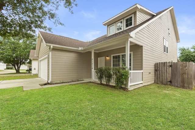21214 Peachvine Ln, Tomball, TX 77375 - view of front of house with an attached garage, driveway, covered porch, and roof with shingles