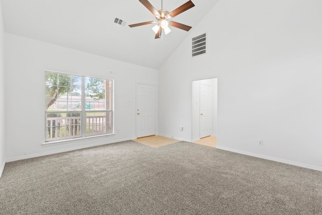 21214 Peachvine Ln, Tomball, TX 77375 - spare room featuring high vaulted ceiling, light carpet, ceiling fan, and baseboards