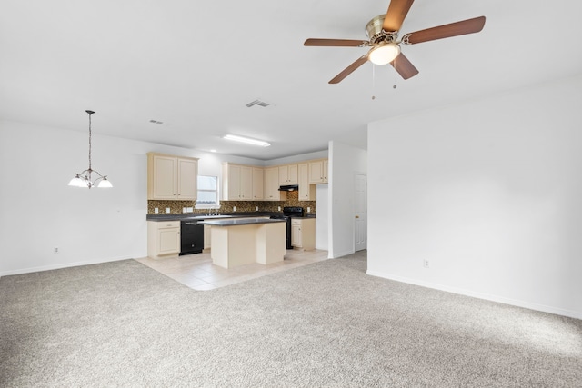 21214 Peachvine Ln, Tomball, TX 77375 - kitchen featuring open floor plan, electric range, dishwasher, cream cabinetry, and dark countertops