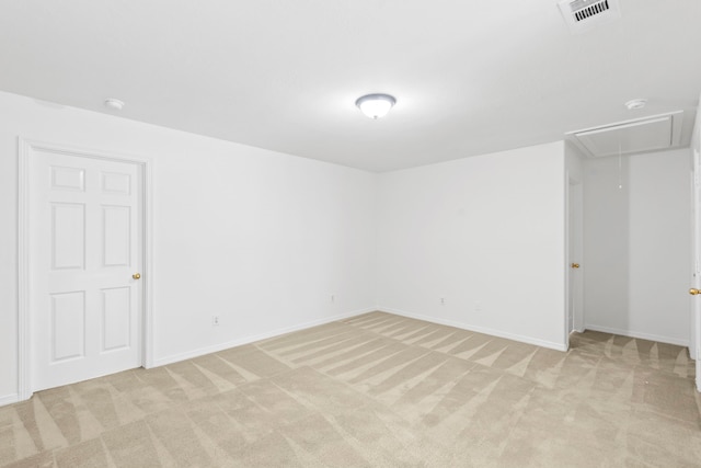 21214 Peachvine Ln, Tomball, TX 77375 - empty room featuring attic access, light carpet, baseboards, and a smoke detector