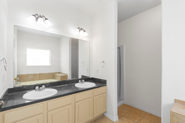 21214 Peachvine Ln, Tomball, TX 77375 - bathroom with a garden tub, tile patterned flooring, and double vanity