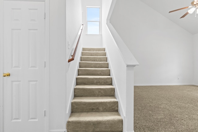 21214 Peachvine Ln, Tomball, TX 77375 - staircase with a ceiling fan, carpet, baseboards, and lofted ceiling