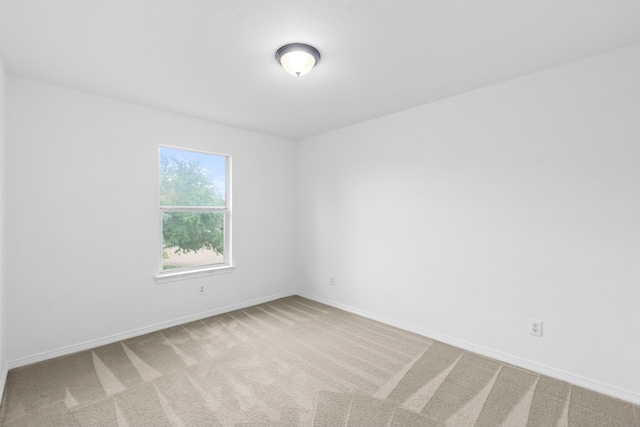 21214 Peachvine Ln, Tomball, TX 77375 - empty room featuring carpet floors and baseboards