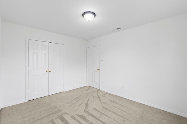 21214 Peachvine Ln, Tomball, TX 77375 - unfurnished bedroom with carpet, a closet, and baseboards