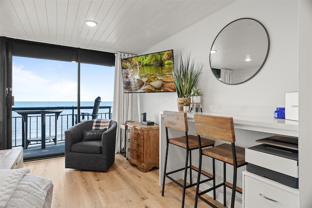 5220 Seawall Blvd Unit 1231, Galveston, TX 77551 - living area with floor to ceiling windows, wood finished floors, wood ceiling, and recessed lighting