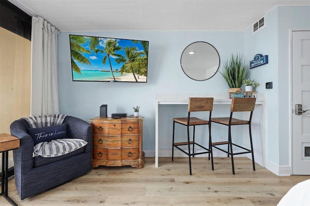 5220 Seawall Blvd Unit 1231, Galveston, TX 77551 - living area with wood finished floors and baseboards