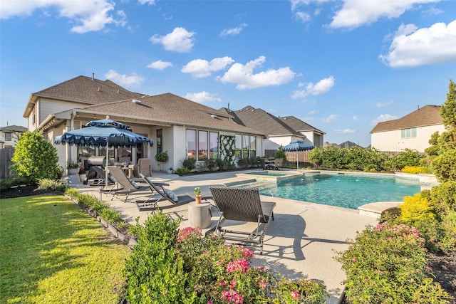 24906 Gingerbush Ln, Tomball, TX 77375 - view of swimming pool featuring a patio and a pool with connected hot tub