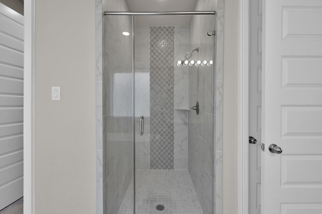 full bathroom featuring a shower stall