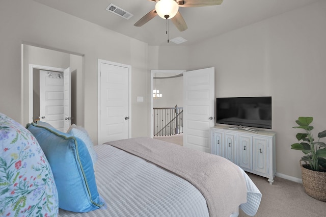 carpeted bedroom with ceiling fan