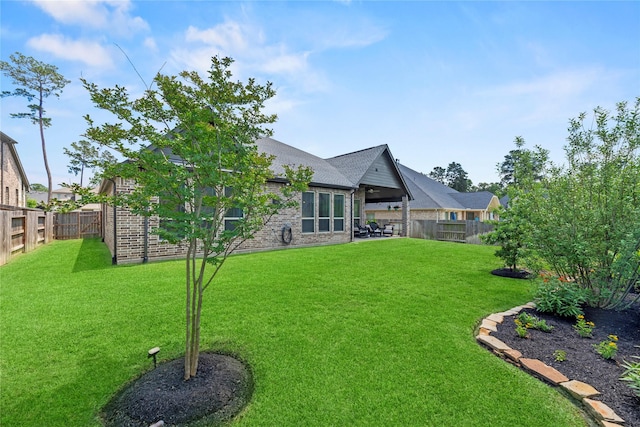 907 Falcon Hollow Ln, Pinehurst, TX 77362 - view of yard with a patio area