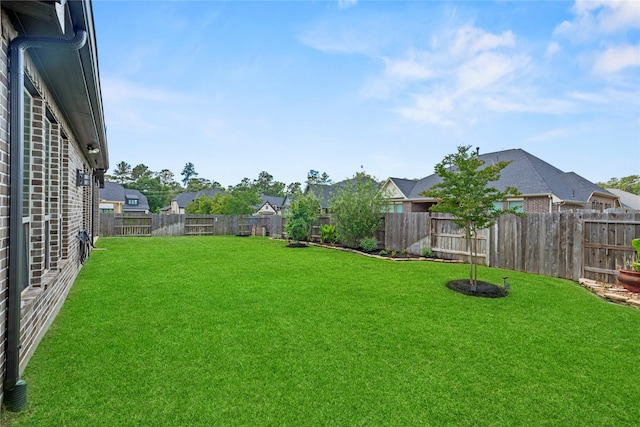 907 Falcon Hollow Ln, Pinehurst, TX 77362 - view of yard with a residential view