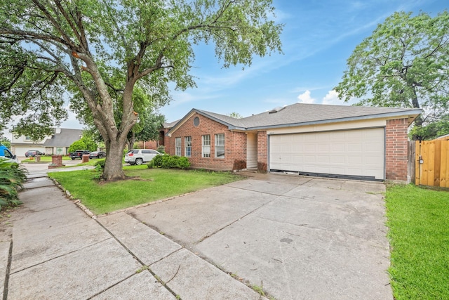 single story home featuring brick siding, driveway, and an attached garage