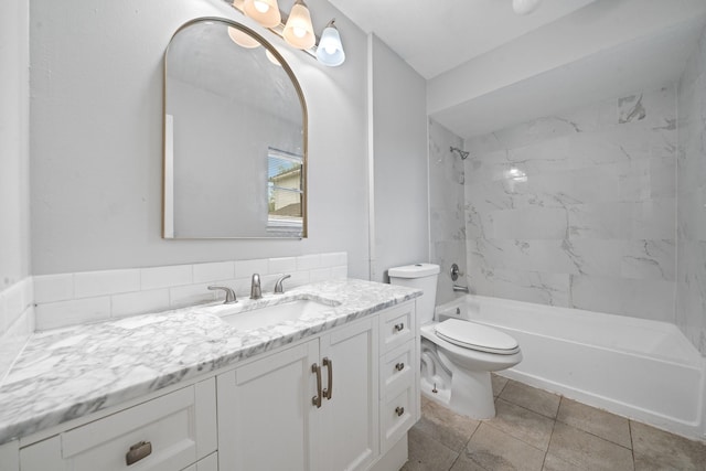 bathroom with toilet, vanity, shower / tub combination, and tile patterned flooring