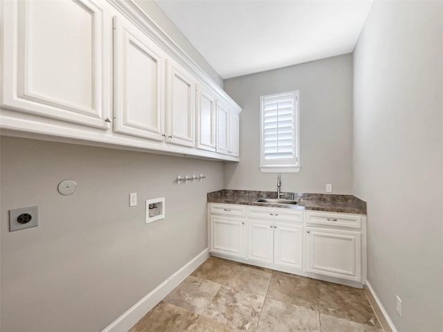 13830 Campwood Ln, Cypress, TX 77429 - washroom featuring cabinet space, electric dryer hookup, baseboards, and hookup for a washing machine