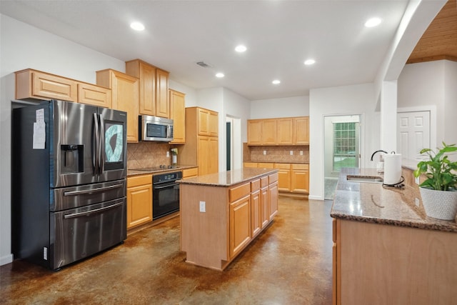 309 County Road 3665 E, Splendora, TX 77372 - kitchen featuring black appliances, a sink, concrete floors, a center island, and light stone countertops