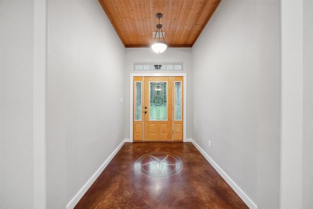 309 County Road 3665 E, Splendora, TX 77372 - entrance foyer with finished concrete floors, baseboards, and wooden ceiling