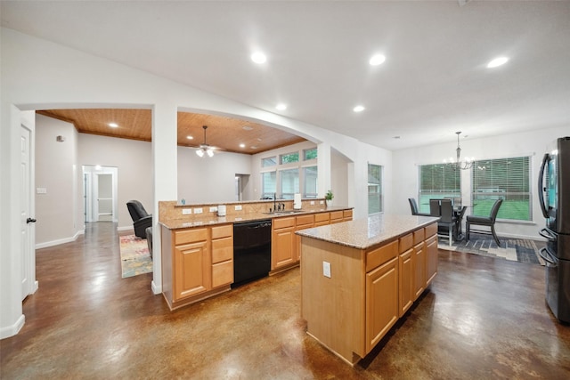 309 County Road 3665 E, Splendora, TX 77372 - kitchen featuring black dishwasher, concrete floors, recessed lighting, a sink, and a center island