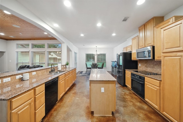 309 County Road 3665 E, Splendora, TX 77372 - kitchen featuring black appliances, finished concrete flooring, a sink, a center island, and recessed lighting