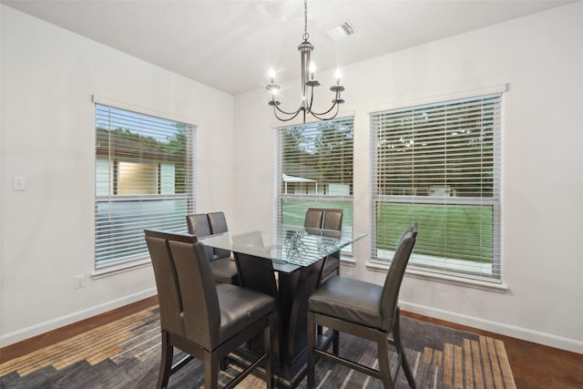 309 County Road 3665 E, Splendora, TX 77372 - dining room with a chandelier and baseboards