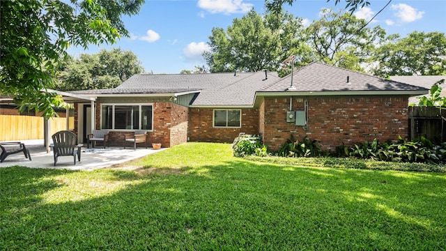 9210 Linkmeadow Ln, Houston, TX 77025 - rear view of house featuring a patio, brick siding, and a shingled roof