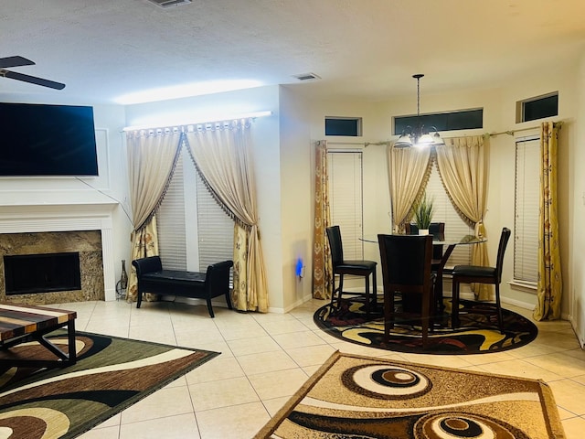 110 Chandler Ct, Sugar Land, TX 77479 - tiled living area featuring ceiling fan, a high end fireplace, and baseboards