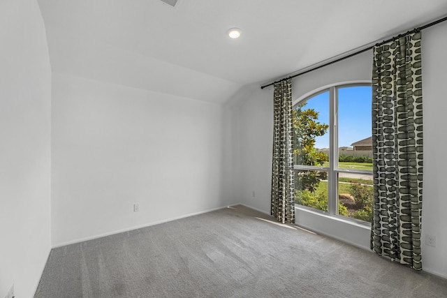 9639 Sterling Arbor Dr, Baytown, TX 77521 - carpeted spare room featuring plenty of natural light, baseboards, and lofted ceiling
