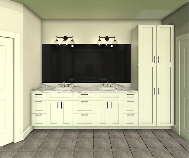 mudroom featuring a sink and dark tile patterned floors