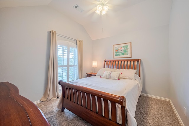bedroom with vaulted ceiling, carpet, baseboards, and a ceiling fan