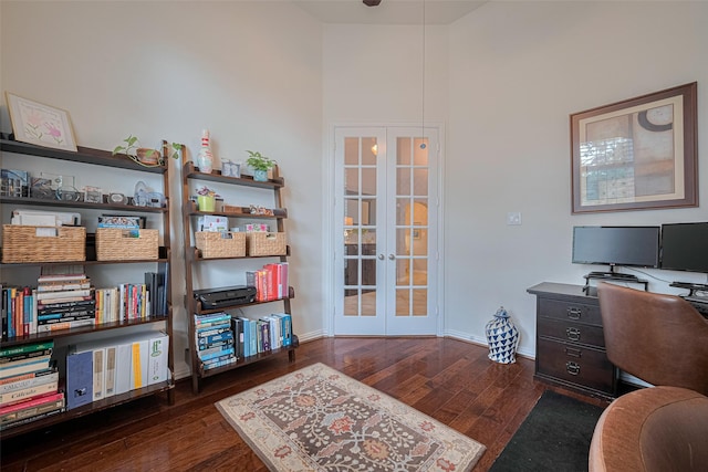 office featuring french doors, wood finished floors, and baseboards