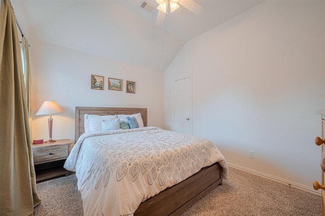 carpeted bedroom with lofted ceiling, a ceiling fan, and baseboards