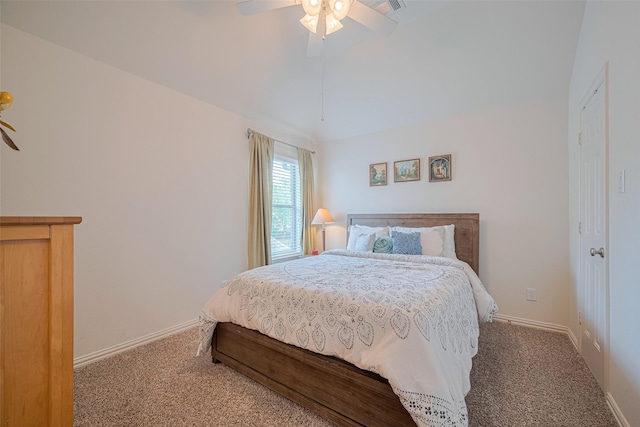 carpeted bedroom featuring baseboards and a ceiling fan