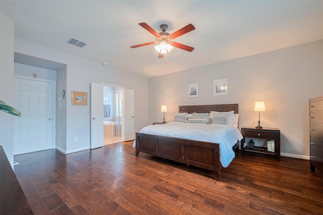bedroom with wood finished floors, baseboards, ensuite bath, and a ceiling fan