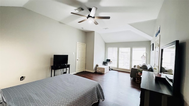 bedroom with vaulted ceiling, dark wood-style floors, baseboards, and a ceiling fan