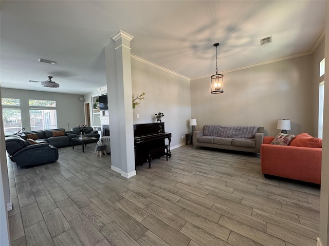 3615 Huggins Way St, Pearland, TX 77584 - living room with wood finished floors, a fireplace, baseboards, and ornamental molding