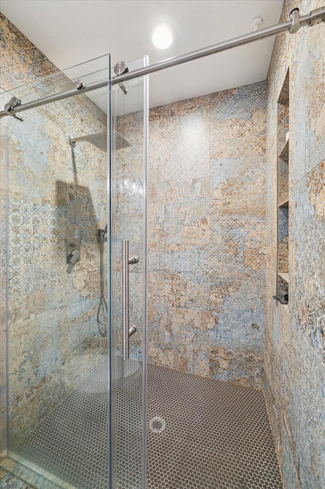 bathroom featuring a stall shower