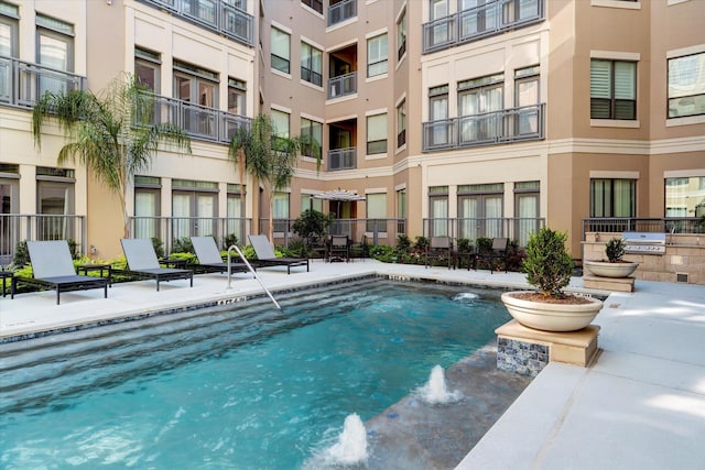 community pool featuring fence