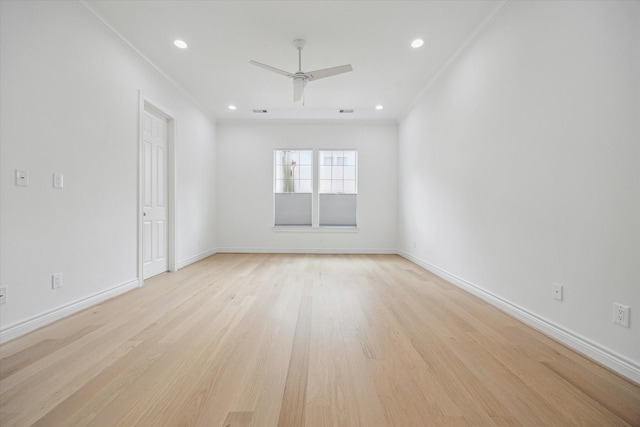 2813 Clinton Dr, Houston, TX 77020 - spare room featuring ornamental molding, ceiling fan, light wood-type flooring, recessed lighting, and baseboards