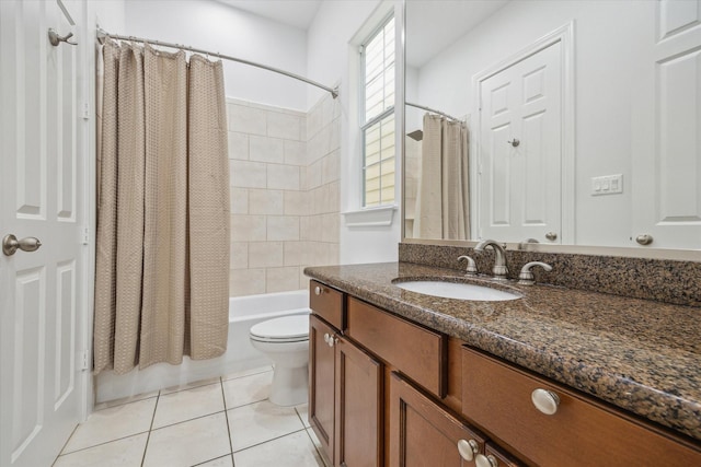 2813 Clinton Dr, Houston, TX 77020 - bathroom featuring tile patterned floors, toilet, vanity, and shower / bath combination with curtain