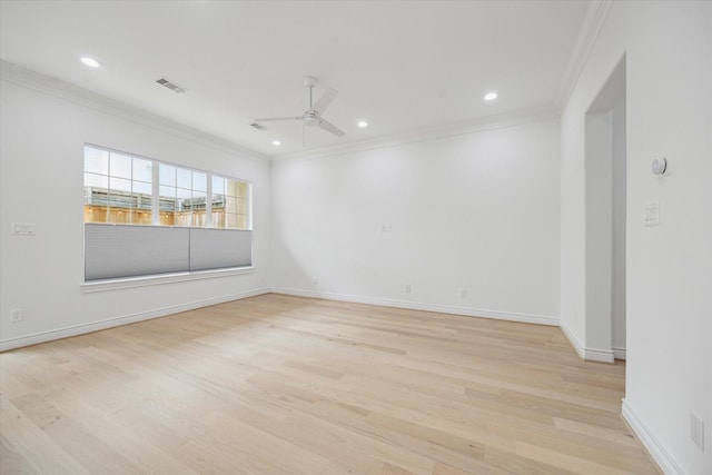 2813 Clinton Dr, Houston, TX 77020 - unfurnished room featuring crown molding, ceiling fan, light wood finished floors, baseboards, and recessed lighting