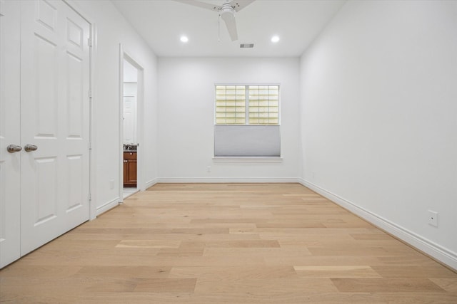 2813 Clinton Dr, Houston, TX 77020 - corridor with light wood finished floors, recessed lighting, and baseboards