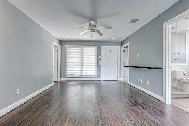 unfurnished living room with ceiling fan, baseboards, wood finished floors, and recessed lighting
