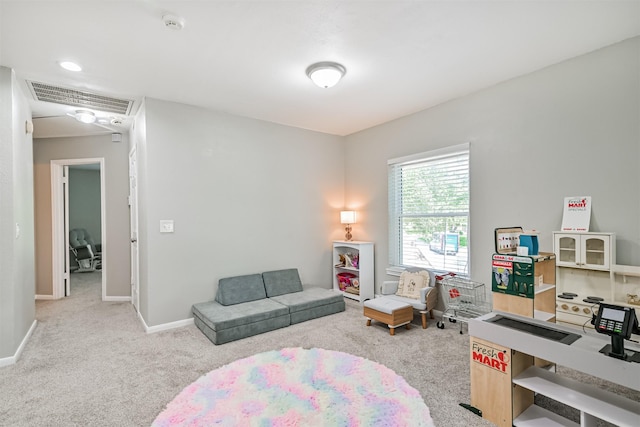 carpeted office space featuring baseboards