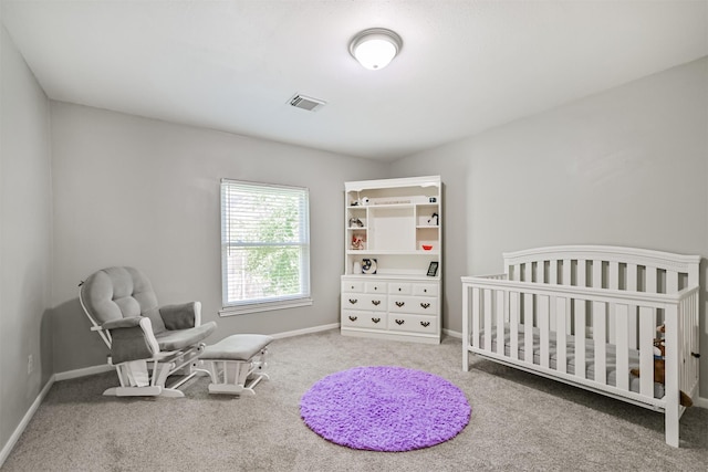 carpeted bedroom with baseboards