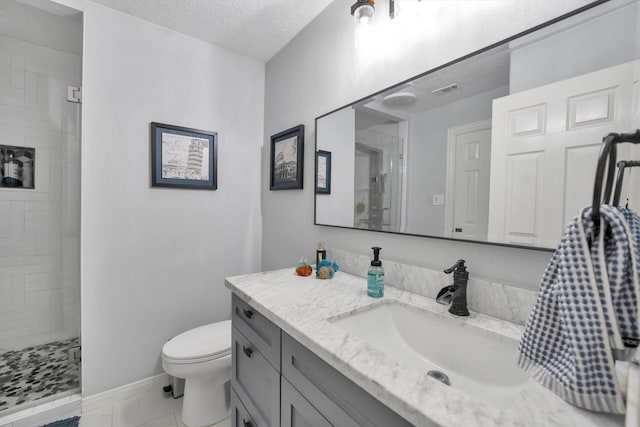 12710 Everhart Pointe Dr, Tomball, TX 77377 - bathroom with a stall shower, vanity, toilet, baseboards, and a textured ceiling