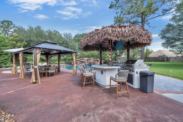 12710 Everhart Pointe Dr, Tomball, TX 77377 - view of patio with area for grilling and a gazebo