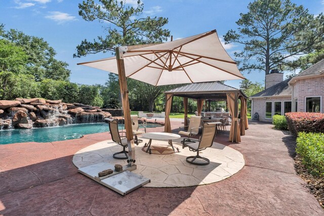 12710 Everhart Pointe Dr, Tomball, TX 77377 - view of patio / terrace with a gazebo and an outdoor pool