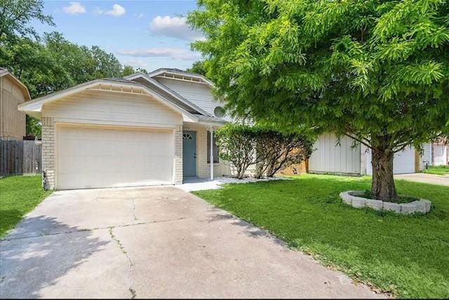 3734 Varla Ln, Houston, TX 77014 - view of front facade with driveway, an attached garage, and brick siding