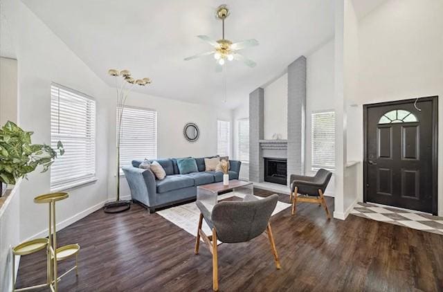 3734 Varla Ln, Houston, TX 77014 - living area with high vaulted ceiling, baseboards, wood finished floors, ceiling fan, and a brick fireplace