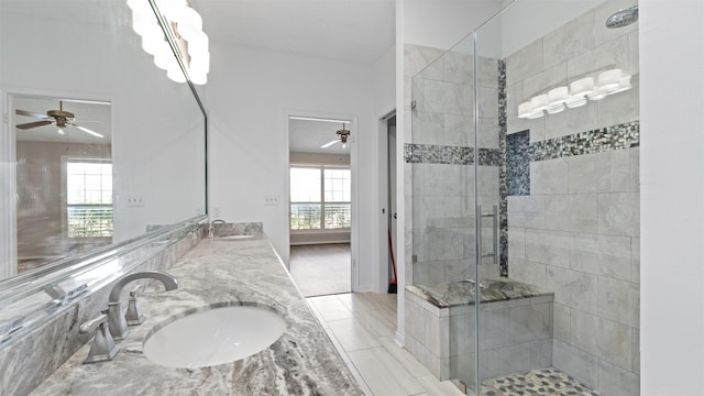16902 River Willow Dr, Spring, TX 77379 - full bathroom featuring ceiling fan, a stall shower, double vanity, and tile patterned floors